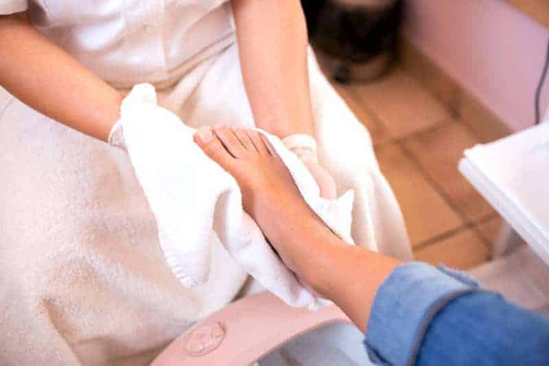 Foot in a white towel